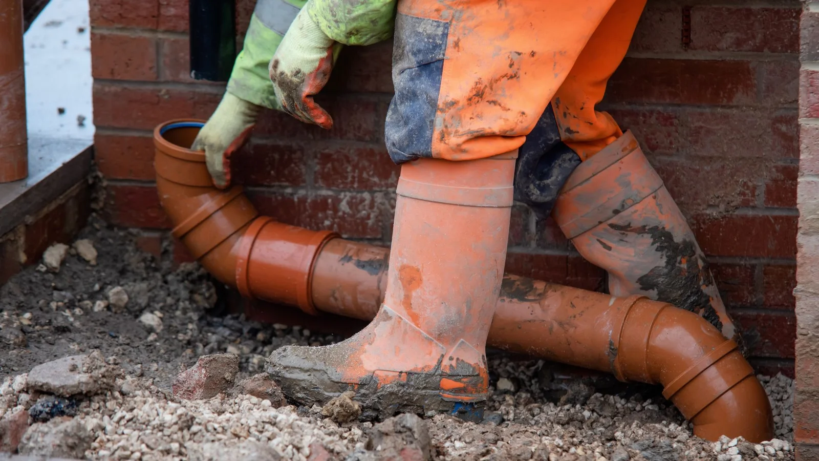 Sewer line repair work in progress showing trenchless technology equipment